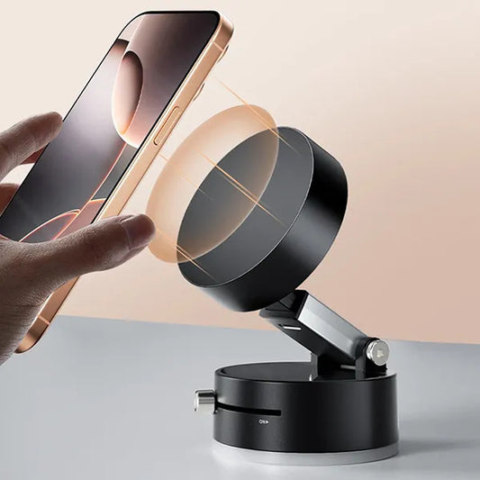 Black phone stand with a smartphone on a light gray surface