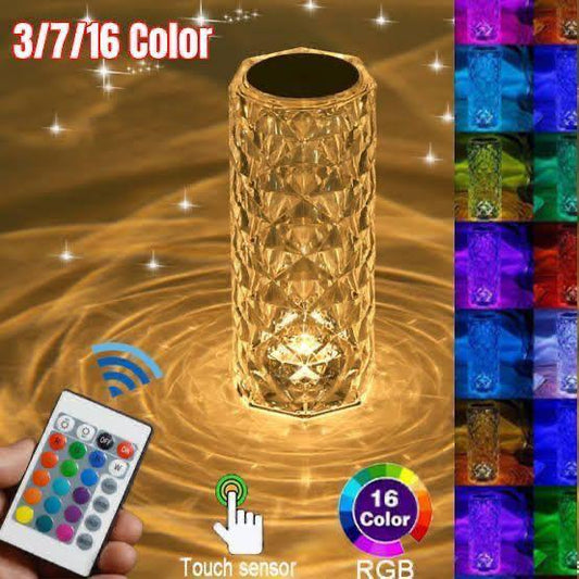 Decorative LED vase with remote control and color-changing feature on a swirling water background.